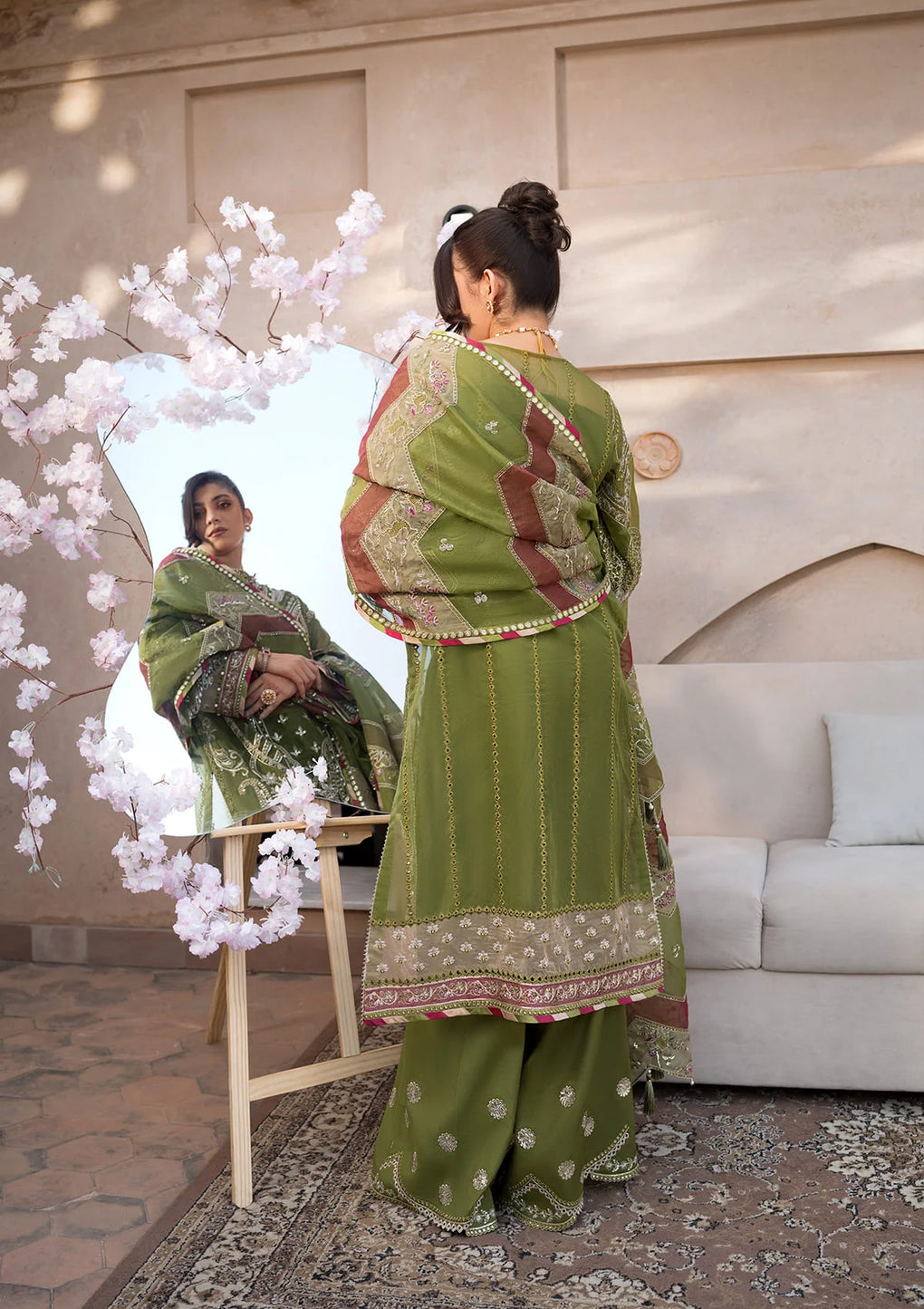 Embroidered Organza Sleeves & Back Daman Border in olive green color.