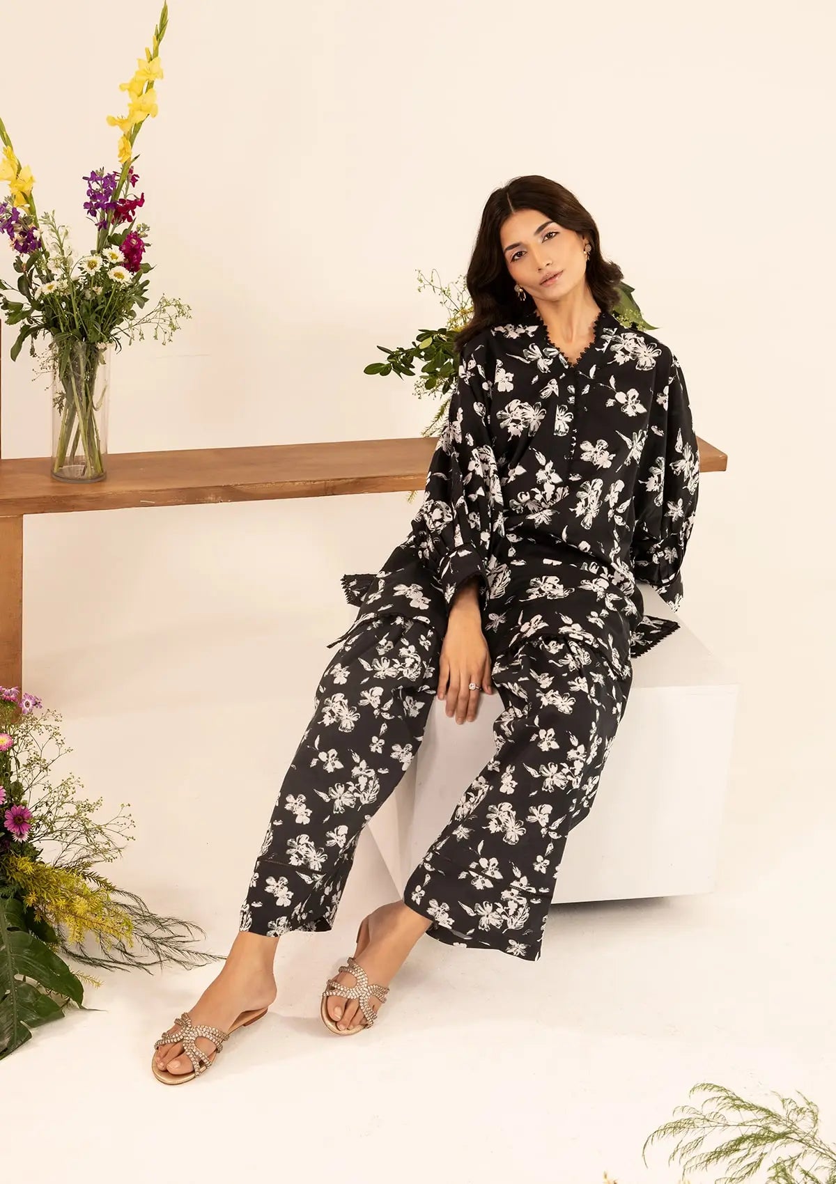 DANAE black dress with white floral prints from ELAF's STITCHED COLLECTION 2025.